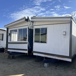 1973  2 bed 2 bath double wide mobile home 24/40 with title 