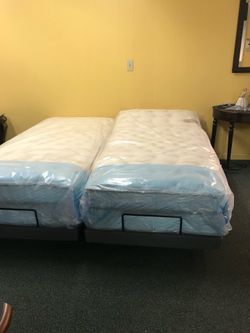 twin XL adjustable bed with massager with Saatva mattress$999. Financing available