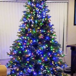 7.5 ft Norway Spruce artificial Christmas tree LED multicolor, multifunction.