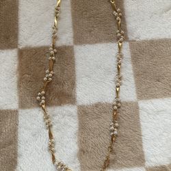 A White And Gold Necklace 
