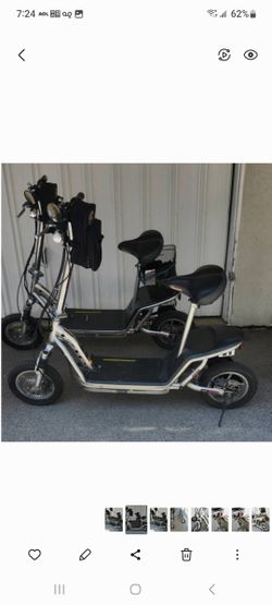 (2)   I ZIP Electric Scooters