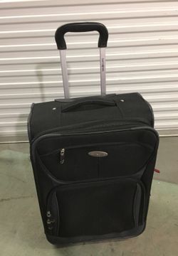 Small compact black Samsonite carry on suitcase / luggage