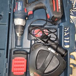 Bosch 36v Hammer Drill With Two Batteries And Charcher  And A Case 