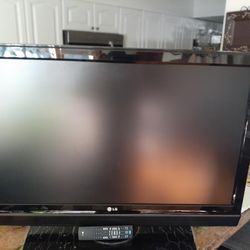 42 " TV -LG WITH STAND  