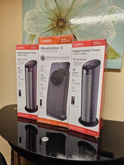 GET READY FOR THIS WINTER LASKO HEATERS CERAMIC TOWER ECONOMIC ENERGY SAVER INCLUDING REMOTE CONTROL FOR FULL SIZE ROOM IF SOMEBODY INTERESTED PLEASE 