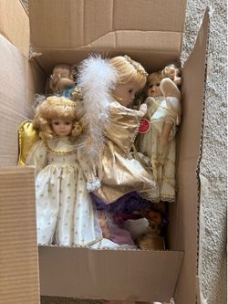 Muñecas y payasosde porcelana