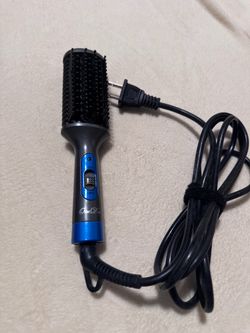 Electric heating hair brush