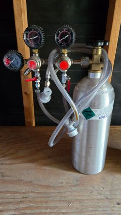 5lb CO2 tank with double tap draw for home brewing kegerator use.  $100 price is firm