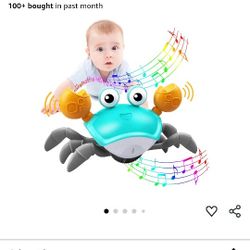 NEW IN BOX. WALKING CRAB, PLAYS MUSIC 🎶 ETC. SEE PHOTOS. CASH PICKUP ONLY 
