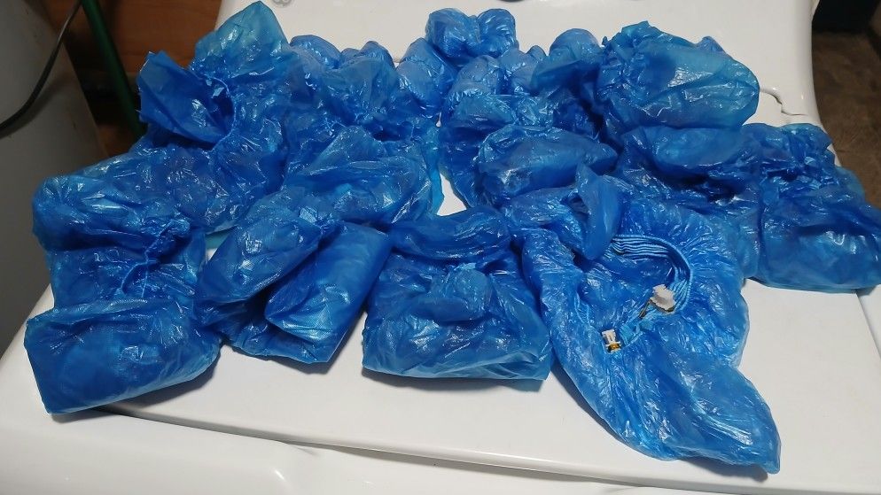 Disposable shoe covers. Approx 70 pairs