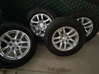 Michelin brand -(90% NEW) GMC tires and Rims