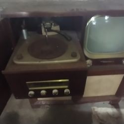 Vintage Motorola TV Cabinet With Roll out Record player And Speaker Box.