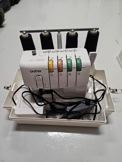 Brother Serger sewing machine with case