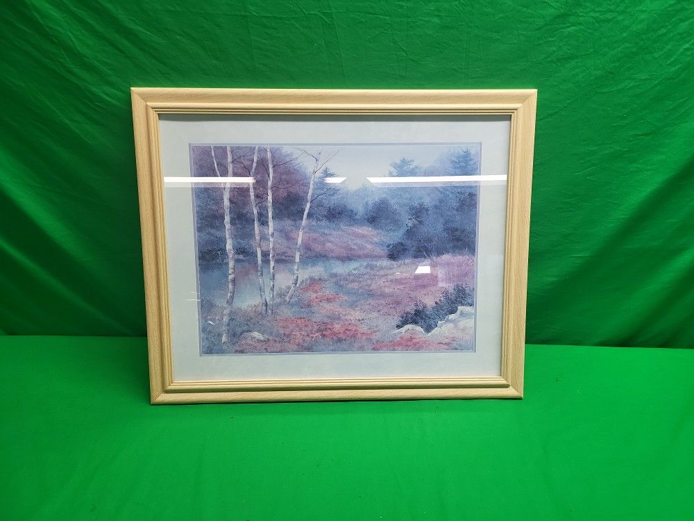 Trees by a river painting