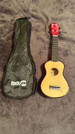 Red and Wood colored Ukulele with case