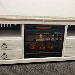 in Stock Willowton 64" TV Stand with Electric Fireplace