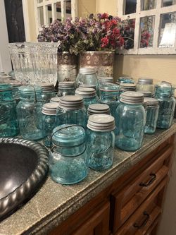 28 Antique ball jars mason jars with lids $420 for all pick up is in Canyon country/Santa Clarita they cross posted MQ