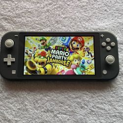 NINTENDO SWITCH LITE with 55 SWITCH GAMES
