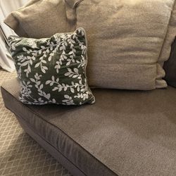 Two Large And One Small Decorative Pillows