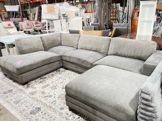 Grey fabric couch with ottoman