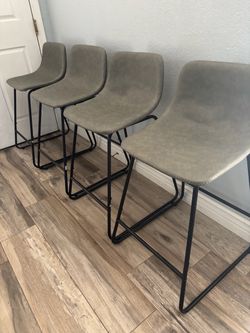 4 grey stools