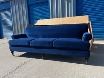 Brand new blue velvet sofa, retails for over $1400