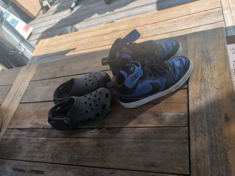 Boys Nike Shoes and Black Crocs