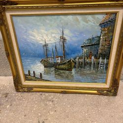 A vintage nautical fishing boat scene oil painting signed by the artist "Marvik". .. framed in a wood gold frame
