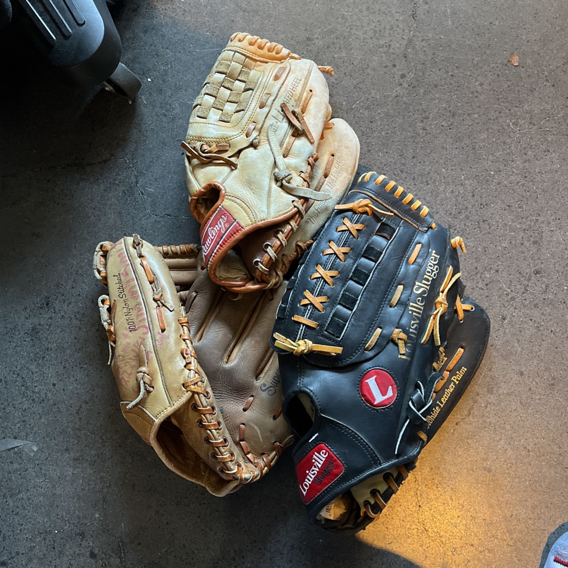 Baseball Gloves, Good Condition One Is A Vintage Glove