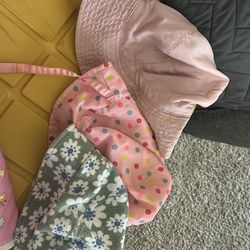 3 toddler girl/baby girl summer hats, cart cover, and 2 towels