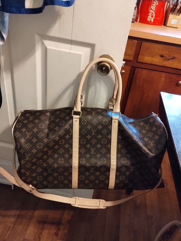 55" Louis Vuitton Duffle Bag