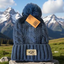 UGG Australia Cable Knit Blue  Beanie With Faux Fur Pom-Pom Fleece Lining Logo