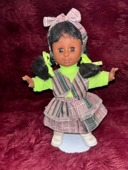 Sandy" doll produced by Olmec Toys in the early 1990s.