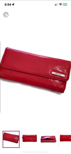 Reaction red faux patent leather wallet. Trifold with magnetic closure. 8”x4” zipper