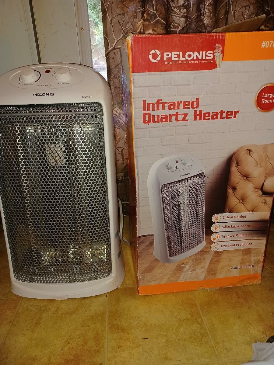 Pelonis infrared quartz heater with thermostat. 2 heat settings.