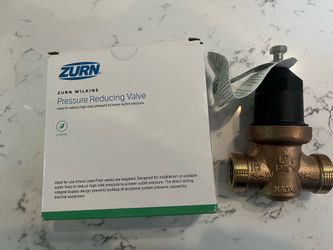 Water pressure reducing valves with attachments