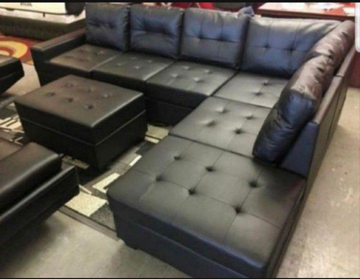 New Sectional With Ottoman And Free Delivery