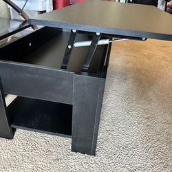 Table With Storage Pops Up 