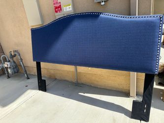 Blue material nail head headboard