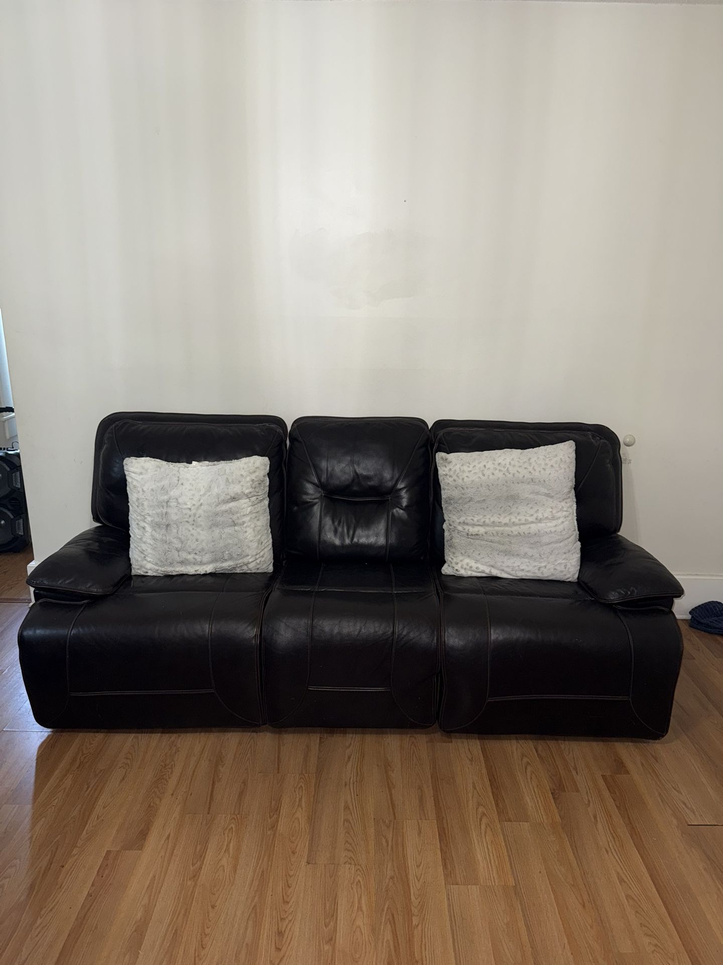 Two Brown Leather Recliner Sofas