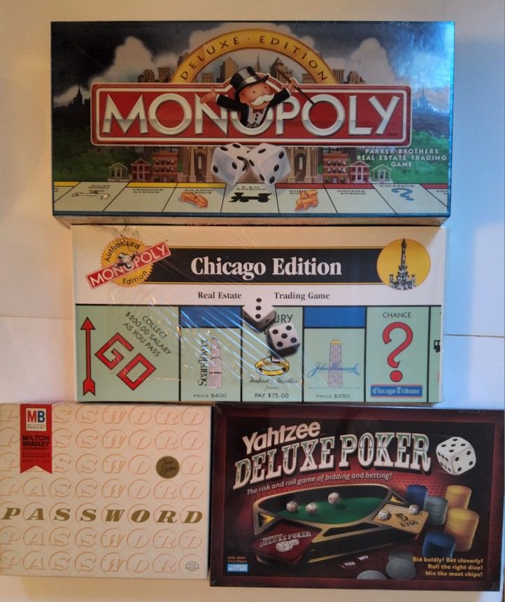 4 games The Deluxe Edition Monopoly , Chicago Edition Monopoly , Password and Yahtzee Deluxe 