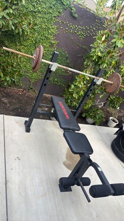 Weider Weight Bench with Barbell and Weights