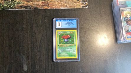 CGC 8 1st edition vileplume holo