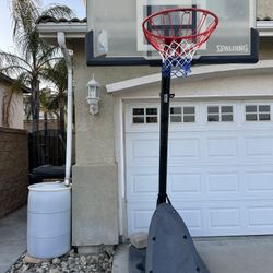 60 inch Spalding NBA Polycarbonate Basketball Height is adjustable