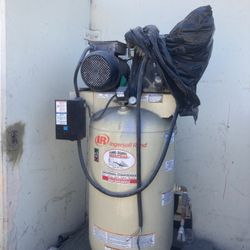 Air Compressor Almost New $1500