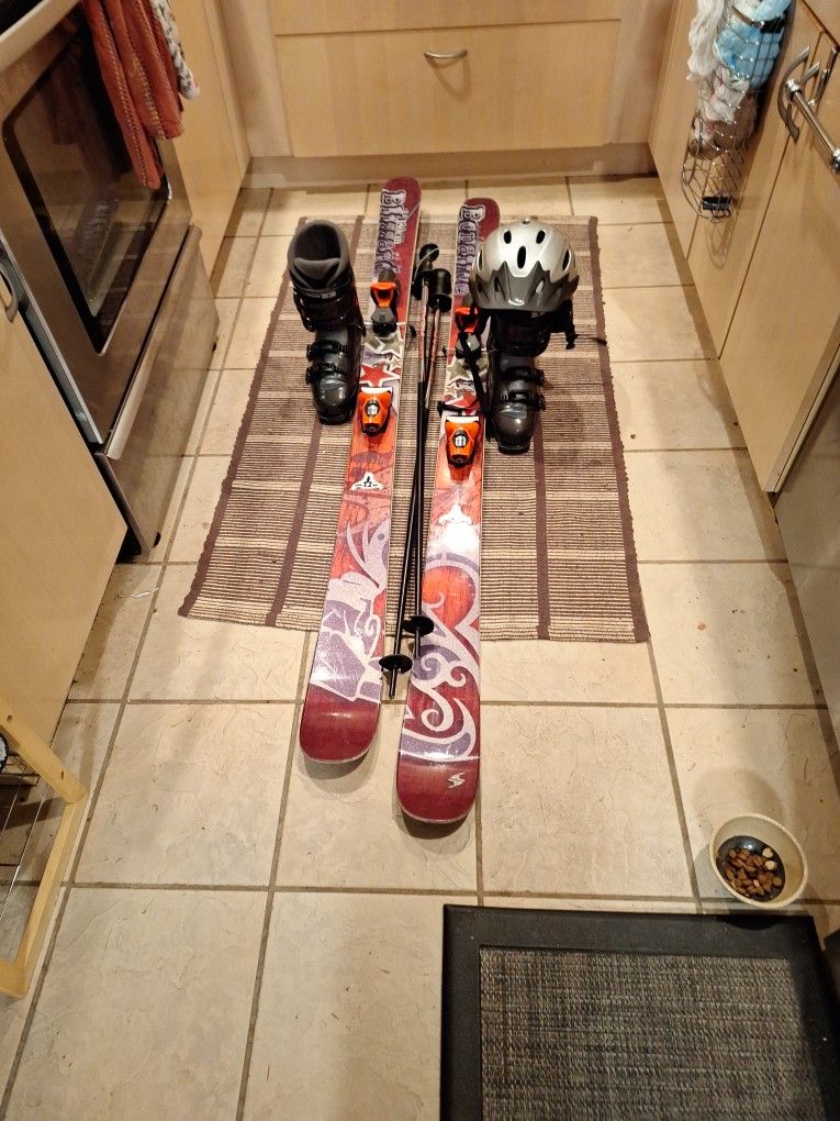 180cm Salomon Skis New Boots Mondo 27. Poles And Helmet Xl