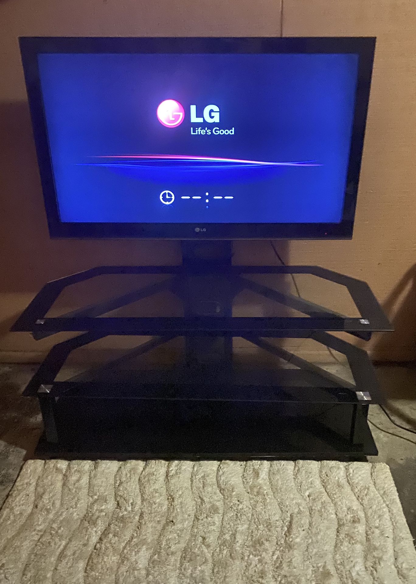 Mounted Glass TV Stand With LG TV