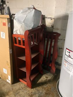 Crib attached changing table