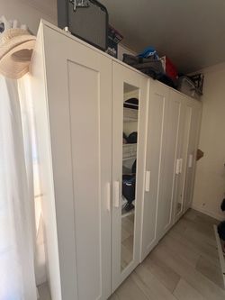 Two white ikea wardrobes good condition