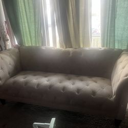 Beige Upholstered Couch 